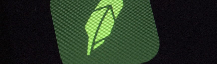 FILE - This Dec. 17, 2020 file photo shows the logo for the Robinhood app on a smartphone in New York. Popular online trading platform Robinhood said Monday, Feb. 1, 2021, that it has lined up $3.4 bi ...