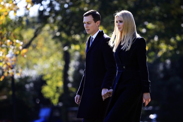 Jared Kushner, senior adviser to President Donald Trump and Ivanka Trump, walk on the South Lawn as they leave the White House in Washington, Tuesday, Oct. 30, 2018, for a trip with President Donald T ...