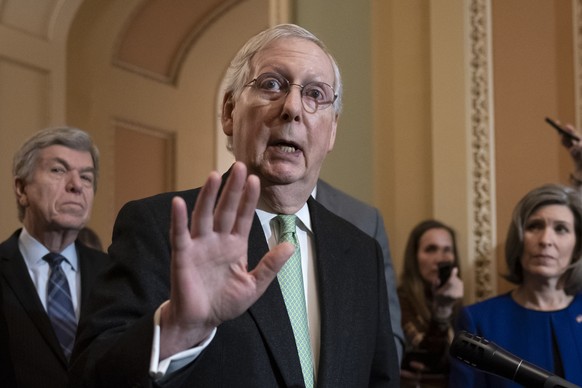 Senate Majority Leader Mitch McConnell, R-Ky., joined by Sen. Roy Blunt, R-Mo., left, and Sen. Joni Ernst, R-Iowa, right, dismisses the impeachment process against President Donald Trump saying, &quot ...
