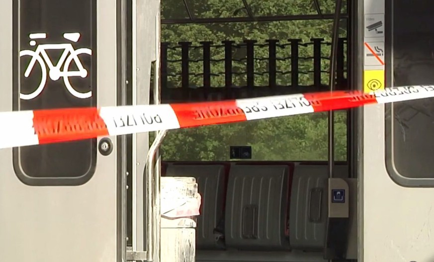 VIDEO GRAB --- A train stands at the trainstation Salez - Sennwald following an attack onboard a train, in Salez, Switzerland, 13 August 2016. According to St. Gallen Canton Police Department, a 27 ye ...