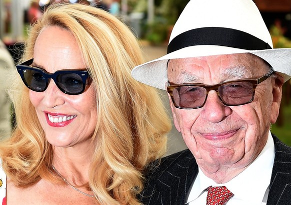 epa05324768 Media mogul Rupert Murdoch (R) with his wife and former model Jerry Hall (L) pose for a picture during the Chelsea Flower Show in London, Britain, 23 May 2016. This years theme focuses on  ...