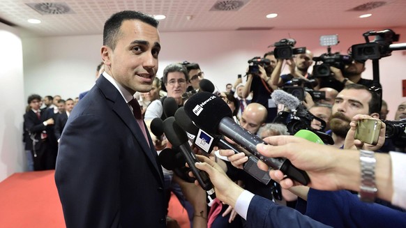 epa06683262 Five-Star Movement (M5S) leader Luigi Di Maio addresses the media during his visit to the Milan International Furniture Fair in Milan, northern Italy, 21 April 2018. Italy does not look cl ...