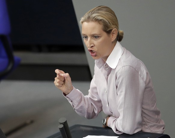 FILE -- In this Wednesday, May 16, 2018 photo Alice Weidel, right, co-faction leader of the Alternative for Germany party, delivers a speech during a meeting of the German federal parliament, Bundesta ...