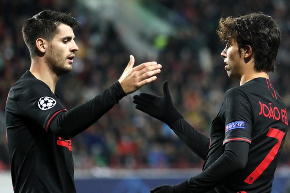 epa07887364 Joao Felix (R) of Atletico Madrid celebrates with teammate Alvaro Morata after scoring the opening goal during the UEFA Champions League match between Lokomotiv Moscow and Atletico Madrid  ...