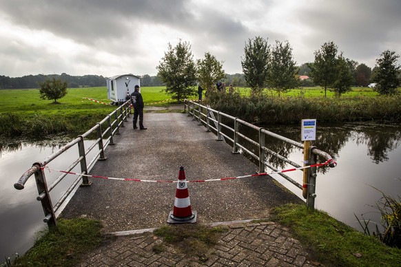 epa07925024 Police are investigating a farm on the Buitenhuizerweg where a father and six children have been living in the basement for years, in Ruinerwold, The Netherlands, 16 October 2019. The fami ...