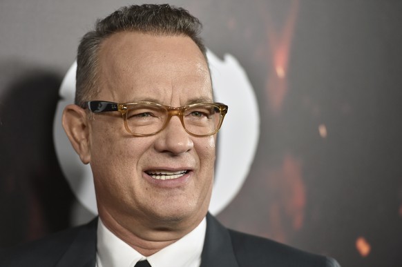 FILE - In this Oct. 25, 2016, file photo, Tom Hanks arrives at a special screening of &quot;Inferno&quot; at the Directors Guild of America Theatre in Los Angeles. Hanks is among the celebrities set t ...