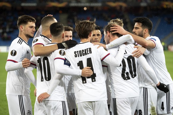 Basel&#039;s players cheer after their 1:0 during the UEFA Europa League round of 32 second leg soccer match between Switzerland&#039;s FC Basel 1893 and Cyprus&#039; Apoel FC at the St. Jakob-Park st ...