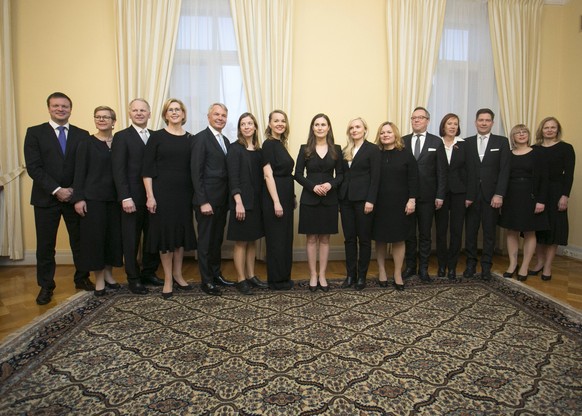 epa08059894 Finaldn&#039;s new cabinet of Prime Minister Sanna Marin (C) pose for group photo in Helsinki, Finland, 10 December 2019. Finland&#039;s new prime minister Sanna Marin is the world&#039;s  ...