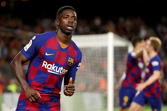 epa07902331 FC Barcelona&#039;s Ousmane Dembele celebrates after scoring during a Spanish LaLiga soccer match between FC Barcelona and Sevilla FC at the Camp Nou stadium in Barcelona, Spain, 06 Octobe ...