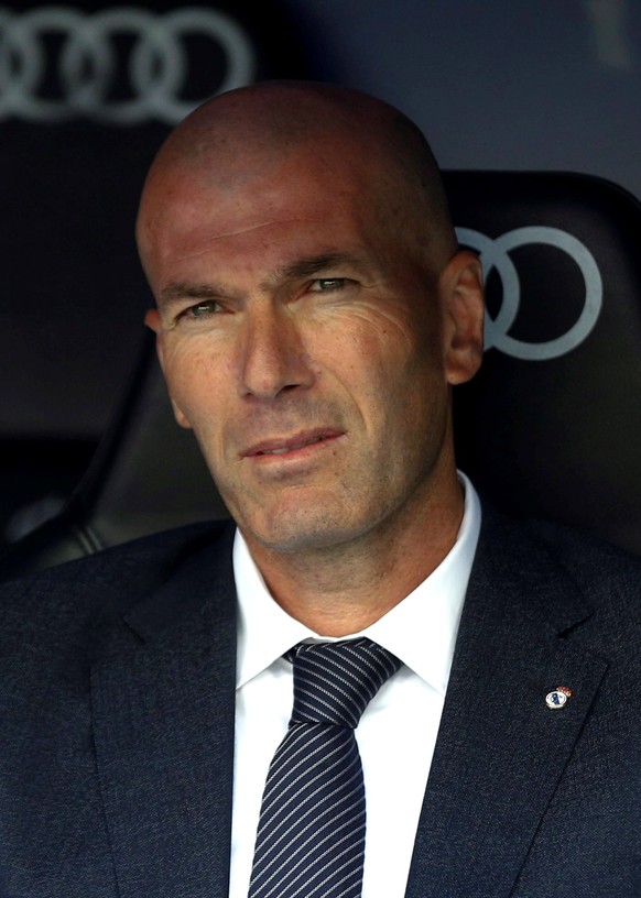 epa07583818 Real Madrid&#039;s head coach Zinedine Zidane reacts at the bench during the Spanish LaLiga soccer match against Real Betis at Santiago Bernabeu stadium in Madrid, Spain, 19 May 2019. EPA/ ...