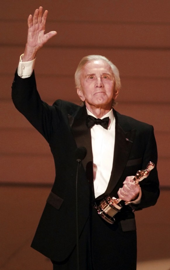 FILE - In this Monday March 25, 1996 file photo, Hollywood star Kirk Douglas accepts the Lifetime Achievement Award at the 68th Annual Academy Awards in Los Angeles. Douglas, the intense, muscular act ...