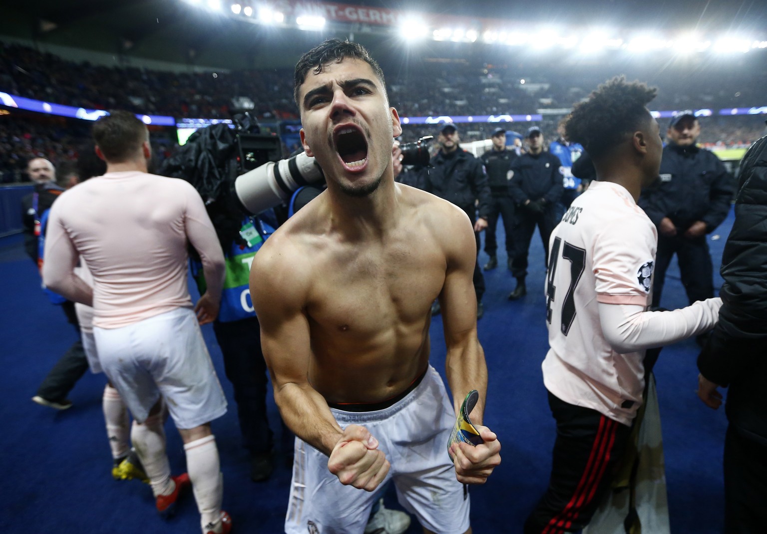 epa07418316 Manchester&#039;s Andreas Pereira celebrates after the UEFA Champions League round of 16 second leg soccer match between PSG and Manchester United at the Parc des Princes Stadium in Paris, ...