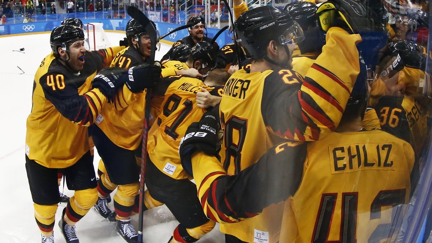 epaselect Players of Germany celebrate after winning the Men&#039;s Ice Hockey semi final match between Germany and Canada at the Gangneung Hockey Centre during the PyeongChang 2018 Winter Olympic Gam ...