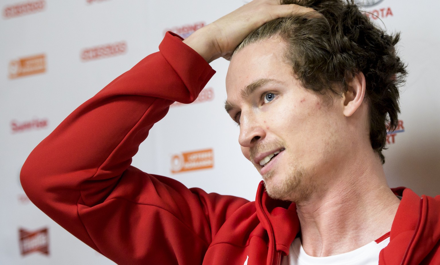 Iouri Podladtchikov snowboarder of Switzerland reacts during a media conference of the Swiss Snowboard Halfpipe team in the House of Switzerland the day of the opening of the XXIII Winter Olympics 201 ...