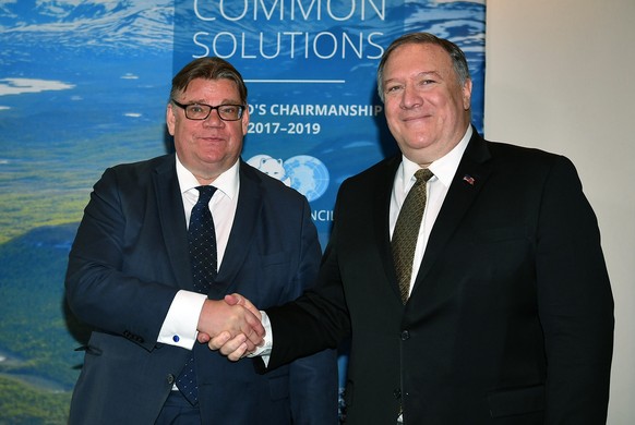 Finland&#039;s Foreign Minister Timo Soini, left, greets Secretary of State Mike Pompeo as he arrives for the Arctic Council ministers&#039; working dinner at the Arktikum museum in Rovaniemi, Finland ...