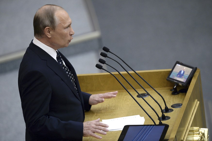 Russian President Vladimir Putin speaks at an opening session of the newly elected State Duma, Russia&#039;s lower house of parliament, in Moscow, Russia, Wednesday, Oct. 5, 2016. In his speech to mem ...