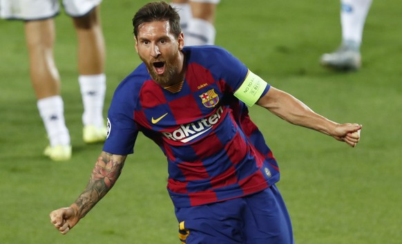 Barcelona&#039;s Lionel Messi celebrates after scoring his side&#039;s second goal during the Champions League round of 16, second leg soccer match between Barcelona and Napoli at the Camp Nou Stadium ...
