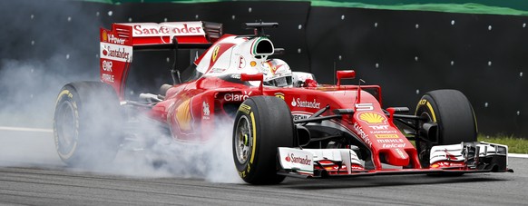 Ferrari driver Sebastian Vettel, of Germany, steers his car during the third free practice for the Brazilian Formula One Grand Prix at the Interlagos race track in Sao Paulo, Brazil, Saturday, Nov. 12 ...
