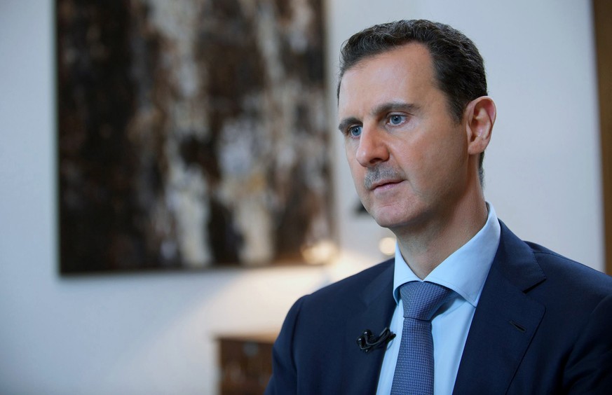 FILE - In this Sunday, Oct. 4, 2015 file photo released by the Syrian official news agency SANA, shows Syrian President Bashar Assad, speaking during an interview with the Iran&#039;s Khabar TV, in Da ...