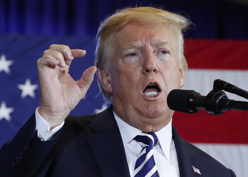 In this Aug. 31, 2018 photo, President Donald Trump gestures while speaking at the Harris Conference Center in Charlotte, N.C. President Donald Trump is escalating his attacks on Attorney General Jeff ...