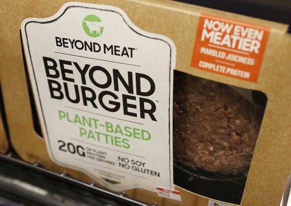 FILE - In this June 27, 2019, file photo a meatless burger patty called Beyond Burger made by Beyond Meat is displayed at a grocery store in Richmond, Va. Beyond Meat said Monday, Nov. 9, 2020 that it ...