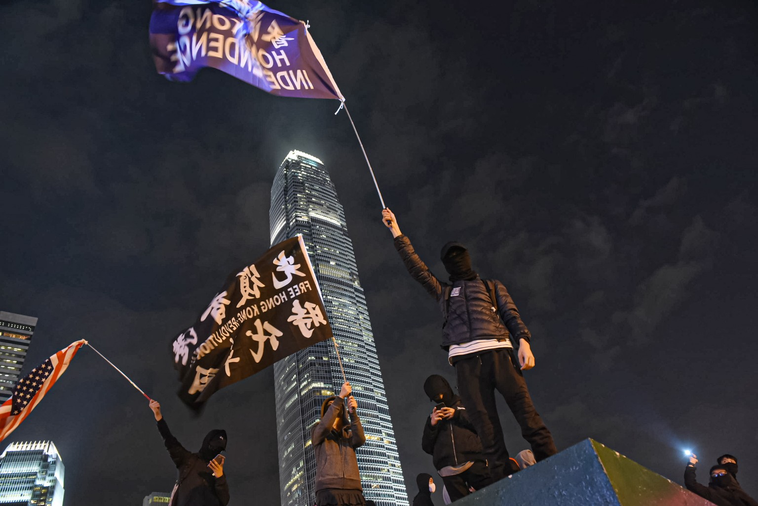 epa08065293 Pro-democracy protesters take part in a rally marking the sixth month anniversary of the protests movement in Hong Kong, China, 12 December 2019. Hong Kong has entered its seventh month of ...