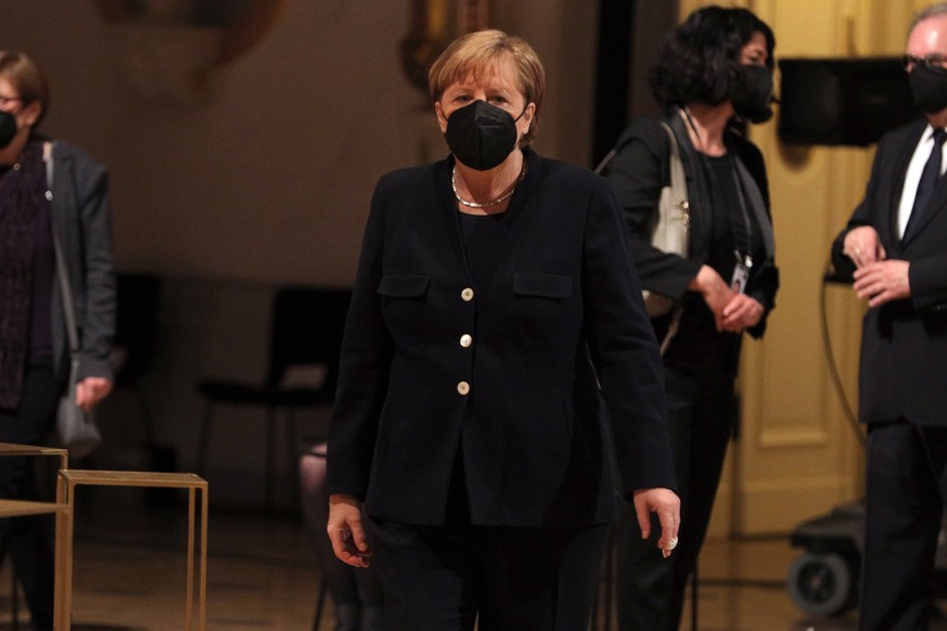epa09143182 German Chancellor Angela Merkel attends the national central mourning act for the deceased during the Corona pandemic at the Konzerthaus Berlin concert hall in Berlin, Germany, 18 April 20 ...