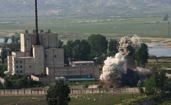 FILE - In this June 27, 2008 file photo released by China&#039;s Xinhua News Agency, the cooling tower of the Yongbyon nuclear complex is demolished in Yongbyon, North Korea, in a sign of its commitme ...