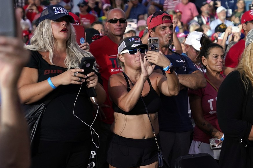 Supporters watch as President Donald Trump speaks during a campaign rally at Orlando Sanford International Airport, Monday, Oct. 12, 2020, in Sanford, Fla. (AP Photo/Evan Vucci)
Donald Trump