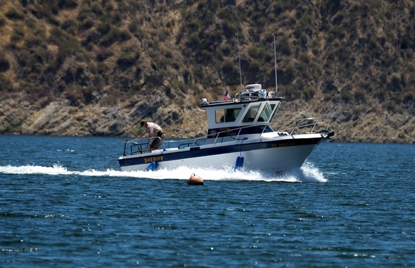 ADDS THAT THE BODY FOUND WAS RIVERA���S - A Ventura County Sheriff���s boat is seen in Lake Piru, Calif., Monday, July 13, 2020. Ventura County Sheriff���s officials confirmed Monday that they have fo ...
