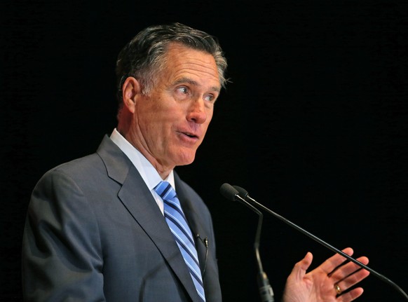 epa05192898 Former Massachusetts Governor and 2012 United States Republican Presidential candidate, Mitt Romney, gives a speech at the Hinckley Instutite of Politics on the campus of the University of ...