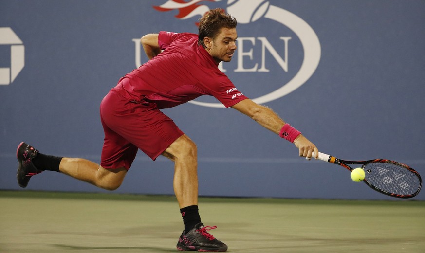 epa05519475 Stan Wawrinka of Switzerland hits a return to Alessandro Giannessi of Italy on the fourth day of the US Open Tennis Championships at the USTA National Tennis Center in Flushing Meadows, Ne ...