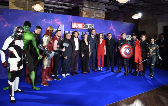epa07497408 Cast and crew of the Avengers Endgame including US actress Scarlett Johansson, US actor Paul Rudd, Australian actor Chris Hemsworth, producer Trinh Tran and US directors Anthony Russo and  ...