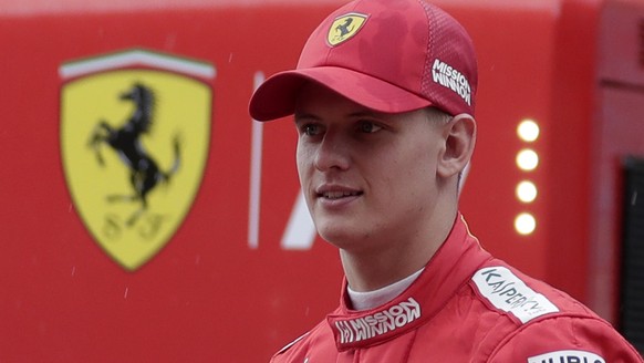Mick Schumacher walks at the pit during his first F1 test for Ferrari at the Bahrain International Circuit in Sakhir, Bahrain, Tuesday, April 2, 2019. Mick Schumacher has moved closer to emulating his ...