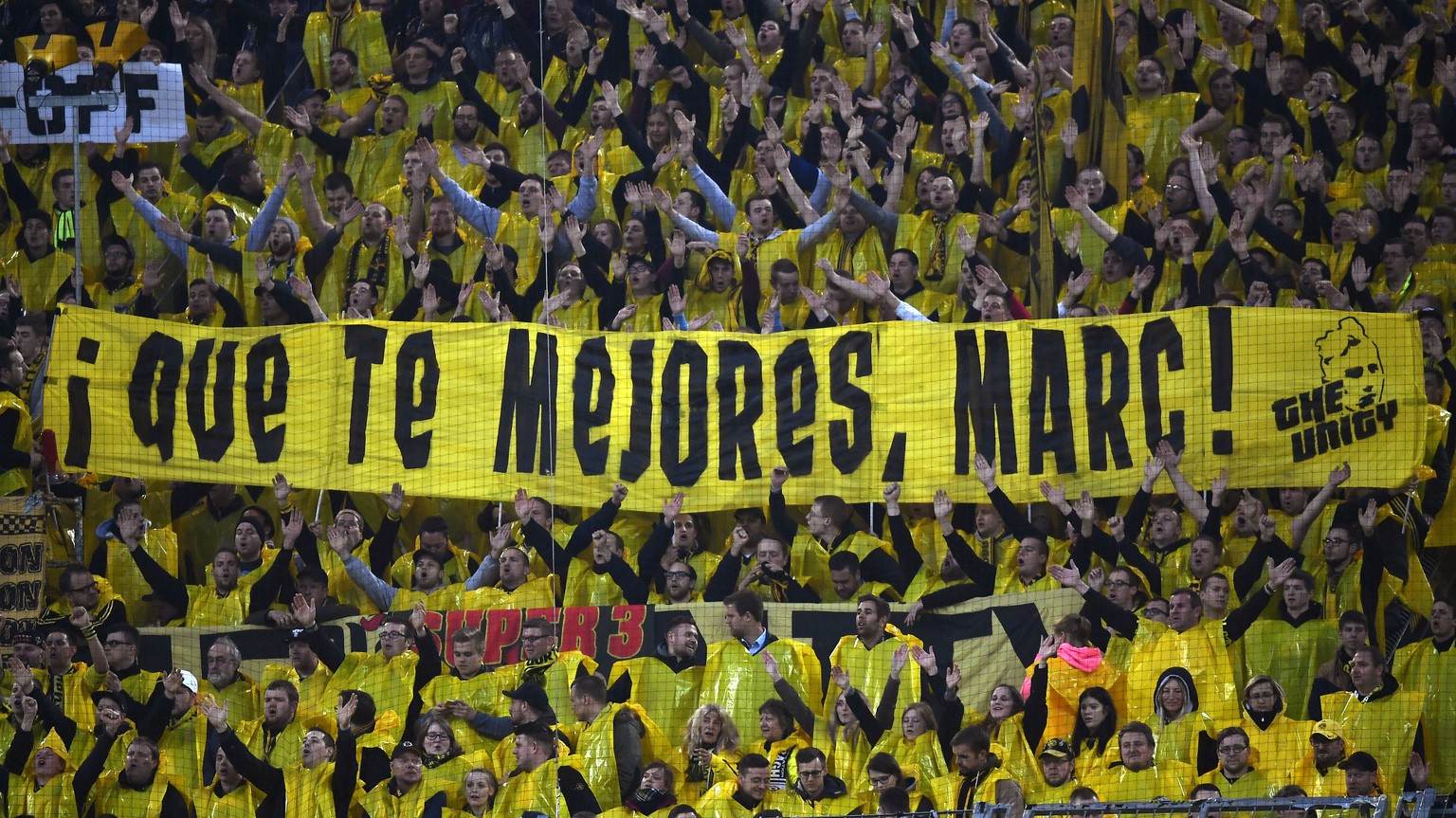 Dortmund fans hold a poster &#039;Get well, Marc!&#039; during the Champions League quarterfinal first leg soccer match between Borussia Dortmund and AS Monaco in Dortmund, Germany, Wednesday, April 1 ...