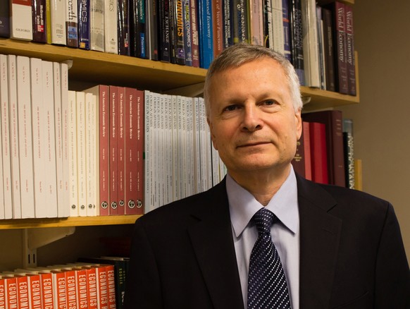 This Sept. 15, 2016, photo provided by Jessica De Simone shows author Dani Rodrik at his office at the Harvard Kennedy School in Cambridge, Mass. In Rodrik&#039;s new book, “Straight Talk on Trade: Id ...