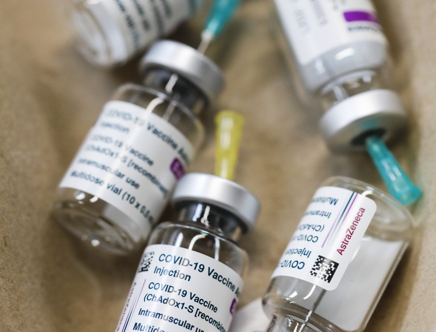 Empty vials of the Astra Zeneca new coronavirus vaccine are seen in the &#039;Austria Center Vienna&#039; in Vienna, Austria, Friday, April 9, 2021. (AP Photo/Lisa Leutner)