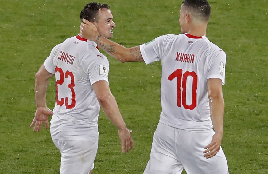Switzerland&#039;s Xherdan Shaqiri and Granit Xhaka, right, celebrate at the end of the group E match between Switzerland and Serbia at the 2018 soccer World Cup in the Kaliningrad Stadium in Kalining ...