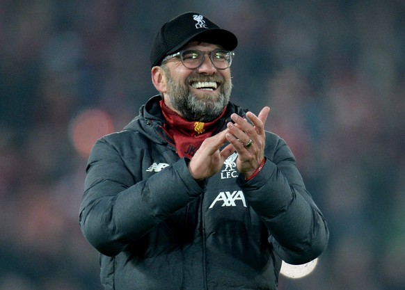 epa08142001 Liverpool&#039;s manager Juergen Klopp greets supporters at the end of the English Premier League soccer match between Liverpool FC and Manchester United held at Anfield in Liverpool, Brit ...