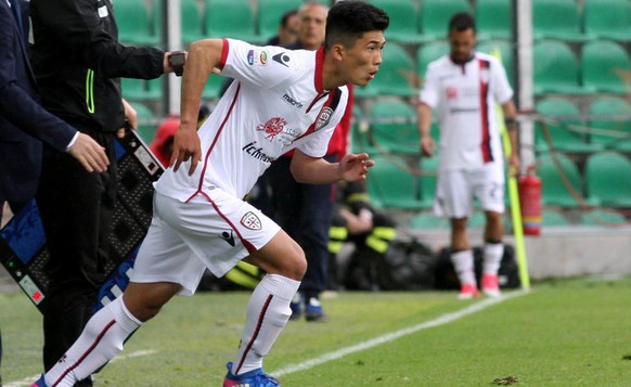 Cagliari&#039;s Han Song Kwang, a new North Korean player in the Serie A, enters in the pitch during the match between Palermo and Cagliari at the Renzo Barbera stadium in Palermo, Italy, Sunday April ...