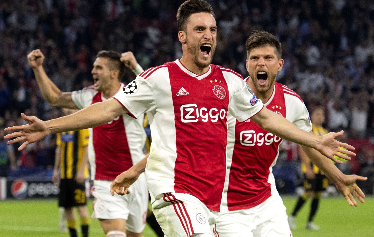 epa07032831 Nicolas Tagliafico (L) of Ajax celebrates with teammate Klaas Jan Huntelaar after scoring the 1-0 during the UEFA Champions League group E soccer match between Ajax Amsterdam and AEK Athen ...