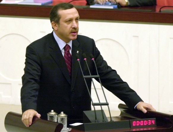 Turkey&#039;s Prime Minister Recep Tayyip Erdogan addresses the Parliament in Ankara Sunday, March 23, 2003 after his government won a vote of confidence. Erdogan&#039;s nine-day old government won th ...