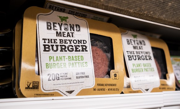 epa07631658 (FILE) - A packet of Beyond Meat burger patties are displayed on a store shelf in New York, New York, USA, 03 May 2019 (reissued 07 June 2019). The company, which sells plant-based meat su ...