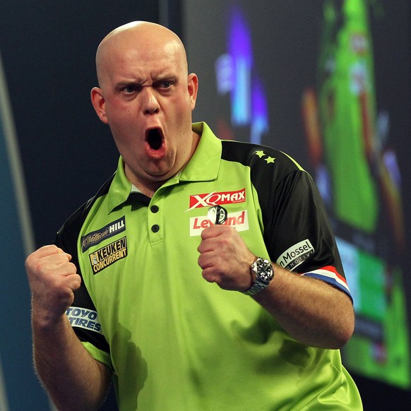 epa07257538 Dutch Michael van Gerwen reacts after winning the first set against British Michael Smith during the PDC World Championship final match at the Alexander Palace in North London, Britain, 01 ...