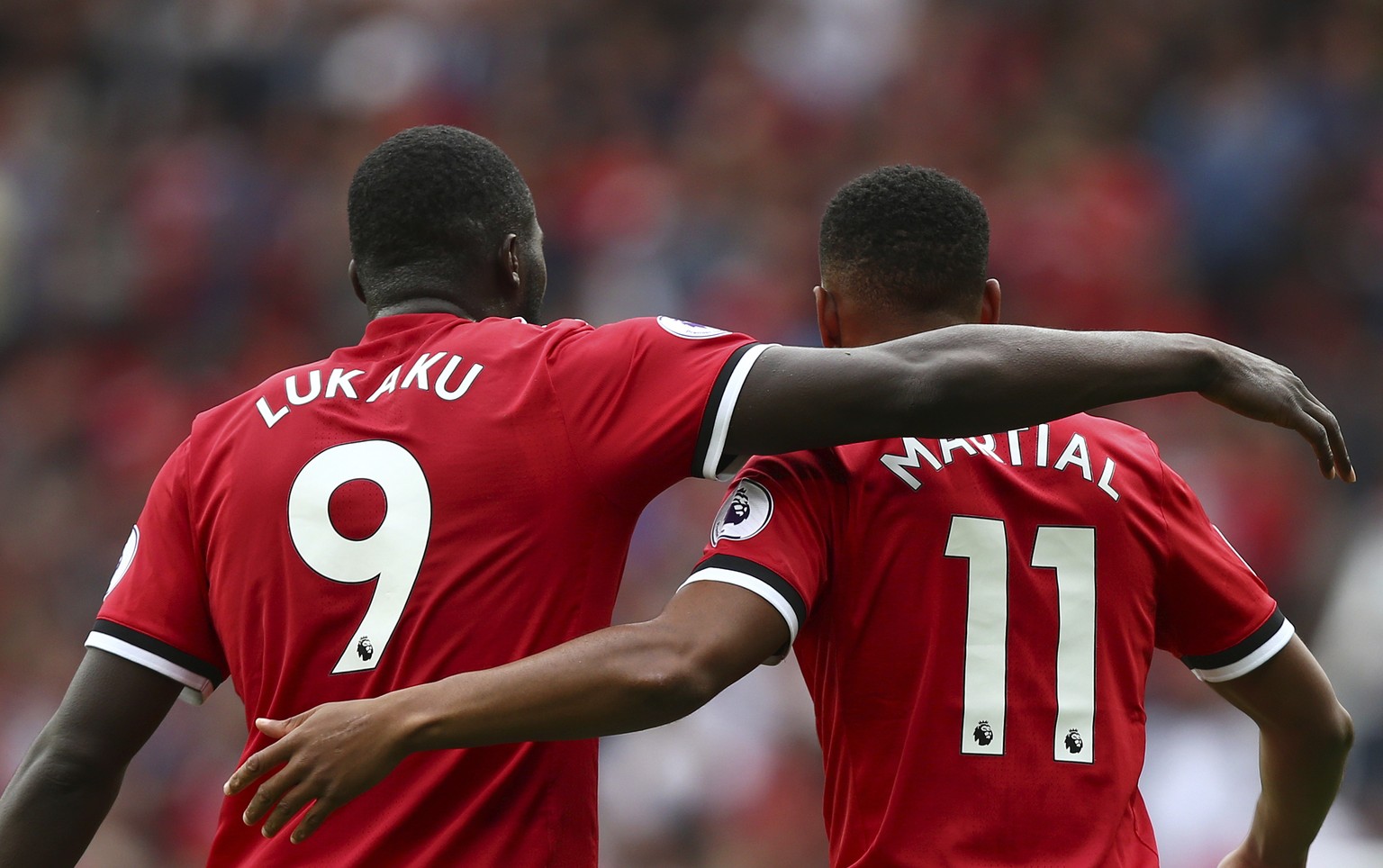 Manchester United&#039;s Anthony Martial, right, celebrates scoring his side&#039;s third goal of the game with Romelu Lukaku during the English Premier League soccer match between Manchester United a ...