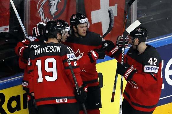 epa05962099 Canadian players celebrate a goal during the IIHF Ice Hockey World Championship 2017 group B preliminary round game between Canada and Switzerland, in Paris, France, 13 May 2017. EPA/ETIEN ...