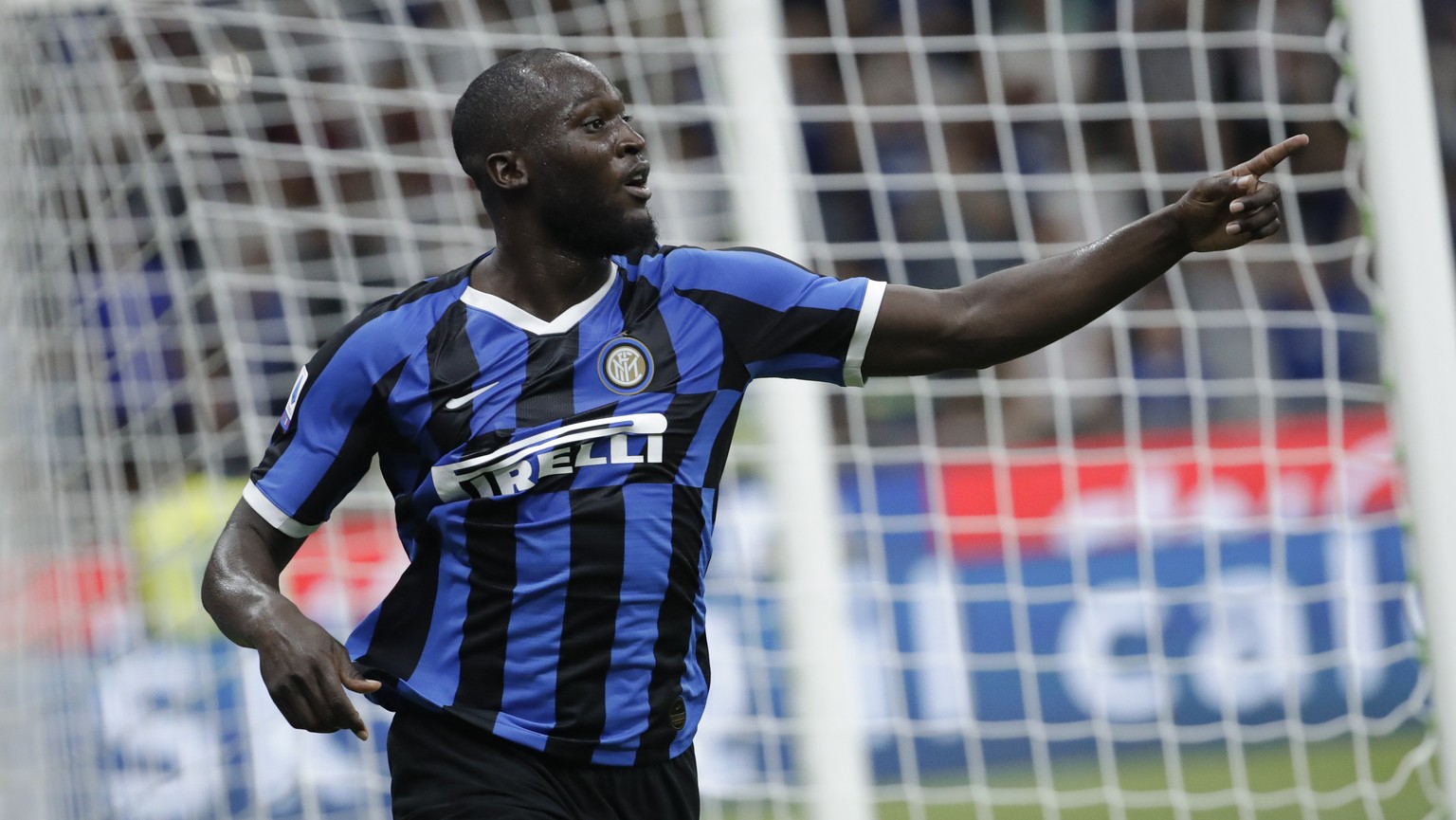 FILE - In this file photo taken on Aug. 26, 2019, Inter Milan&#039;s Romelu Lukaku celebrates after scoring his side&#039;s third goal during the Serie A soccer match between Inter Milan and Lecce at  ...