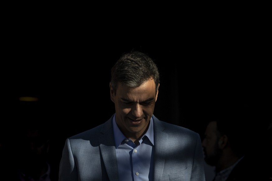 Spanish Prime Minister and Socialist Party candidate Pedro Sanchez leaves a polling station after casting his vote during Spain&#039;s general election in Pozuelo de Alarcon, outskirts of Madrid, Sund ...