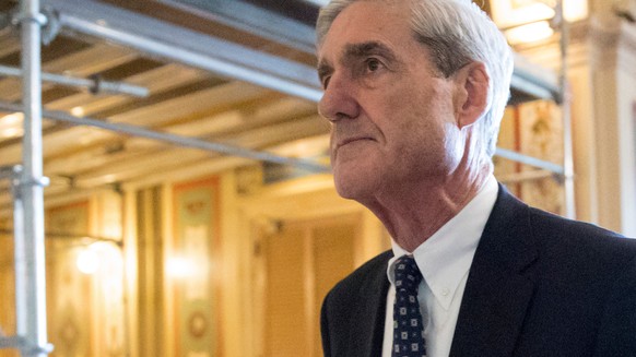 FILE - In this June 21, 2017, file photo, special counsel Robert Mueller departs after a meeting on Capitol Hill in Washington. The Associated Press and other news organizations are asking a judge to  ...