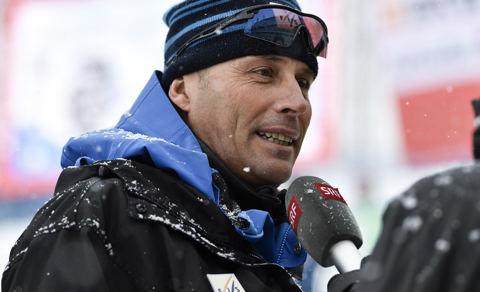 CAPTION CORRECTION: CORRECTS NATIONALITY --- Markus Waldner of Italy, FIS race director speaks with a journalist during the cancelled men&#039;s Downhill race of the FIS Alpine Ski World Cup at the La ...